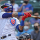 The Cubs’ Javy Baez swings (and likely misses) at the plate.